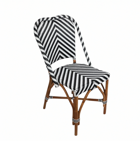 Chair with a black and white zigzag patterned cover on a white background