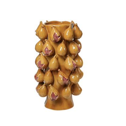Vase shaped like a cluster of figs on a white background